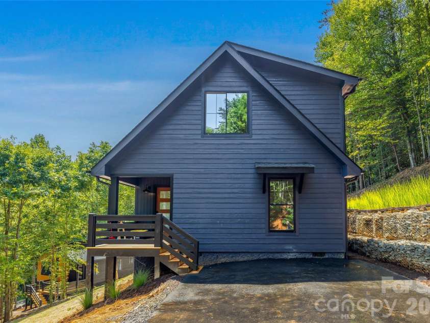 87 Catatoga Trail, Marion, NC 83452.  MLS# CAR4403584, YatesRealty ID 46554. Modern mountain exterior