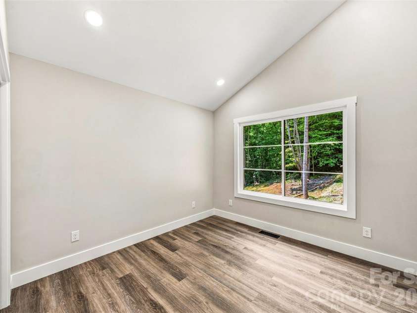 60 Catatoga Trail, Marion, NC 83452.  MLS# CAR4403563, YatesRealty ID 46556. Bedroom with natural light