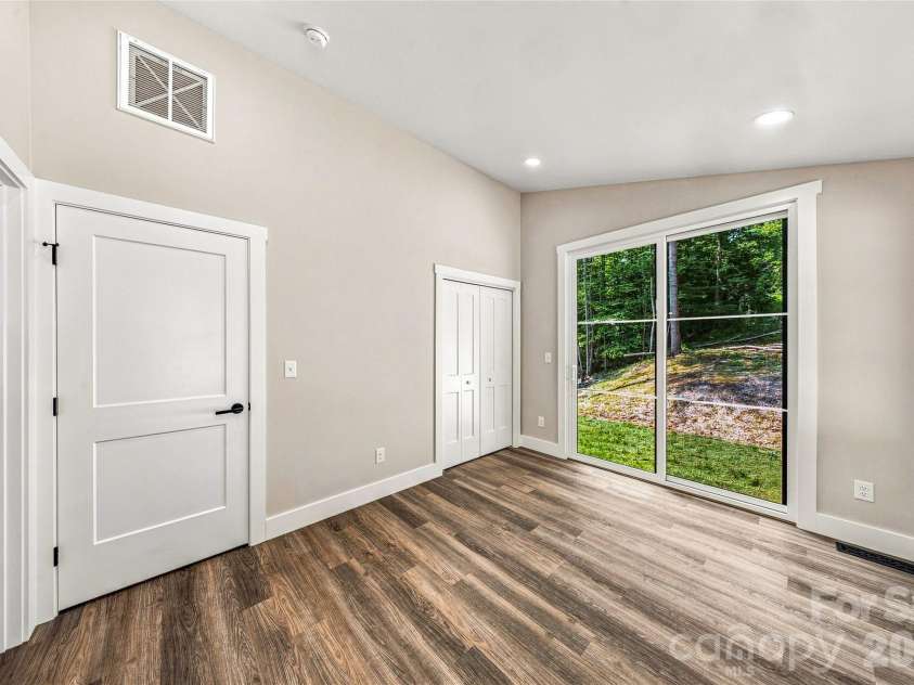 60 Catatoga Trail, Marion, NC 83452.  MLS# CAR4403563, YatesRealty ID 46556. Bright bedroom with generous closet space
