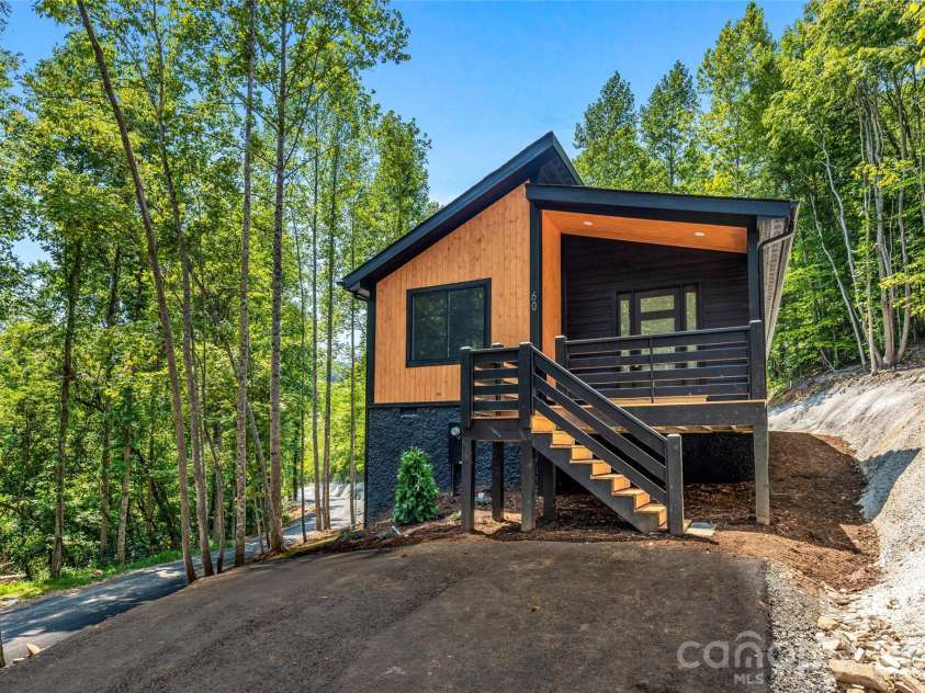 60 Catatoga Trail, Marion, NC 83452.  MLS# CAR4403563, YatesRealty ID 46556. Contemporary cabin exterior