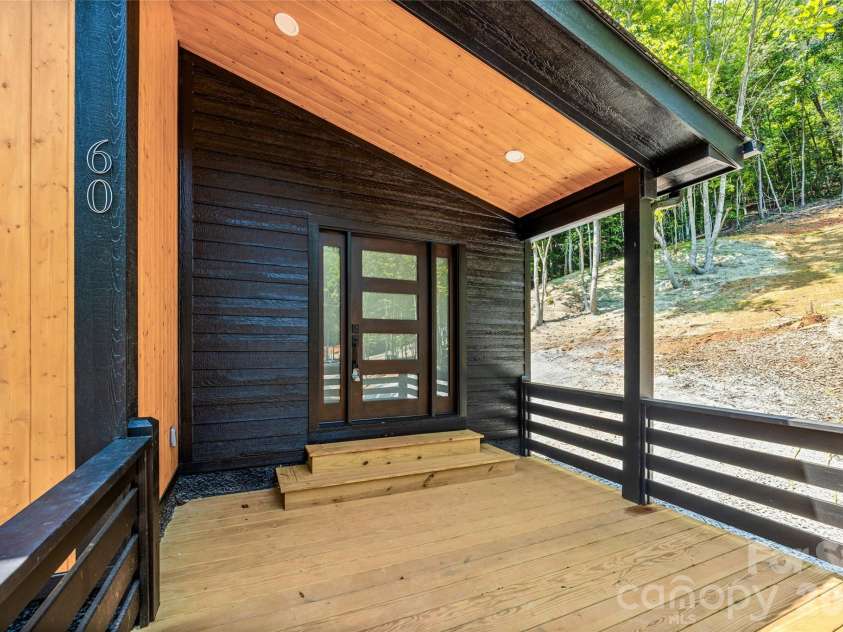 60 Catatoga Trail, Marion, NC 83452.  MLS# CAR4403563, YatesRealty ID 46556. Covered front porch