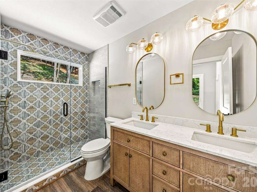 60 Catatoga Trail, Marion, NC 83452.  MLS# CAR4403563, YatesRealty ID 46556. Full bath with tiled walk-in shower