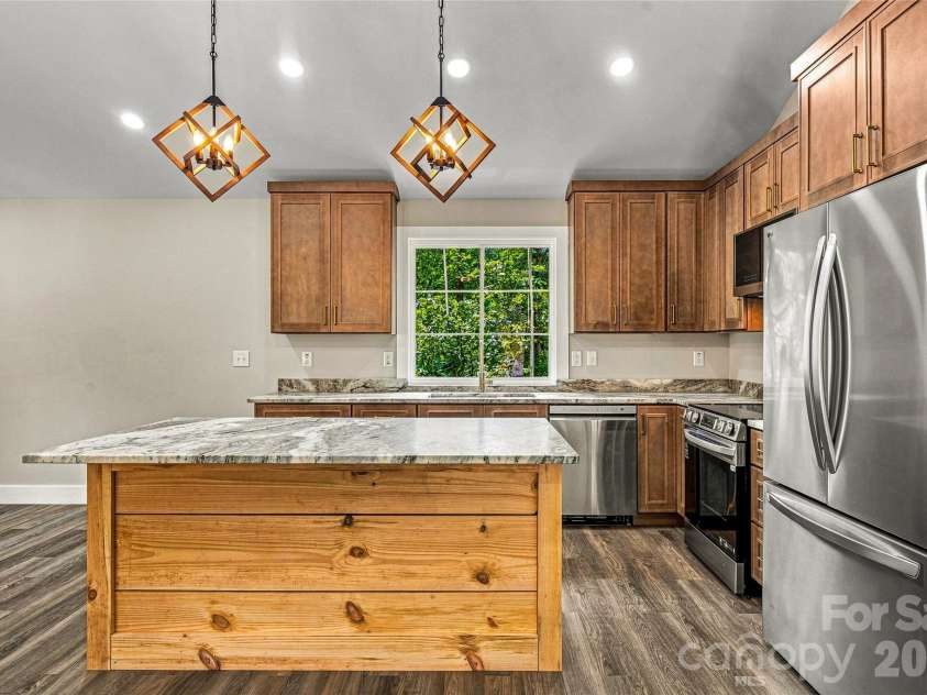 60 Catatoga Trail, Marion, NC 83452.  MLS# CAR4403563, YatesRealty ID 46556. Kitchen with large island