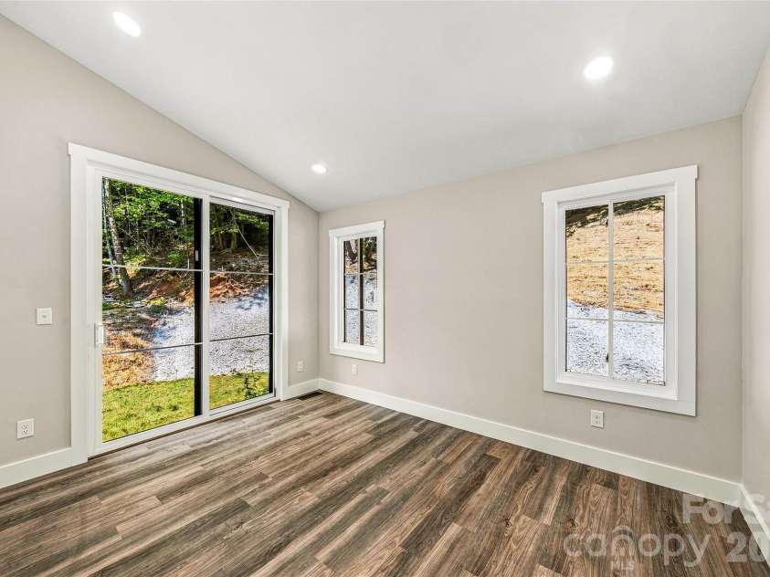 60 Catatoga Trail, Marion, NC 83452.  MLS# CAR4403563, YatesRealty ID 46556. Light-filled bedroom