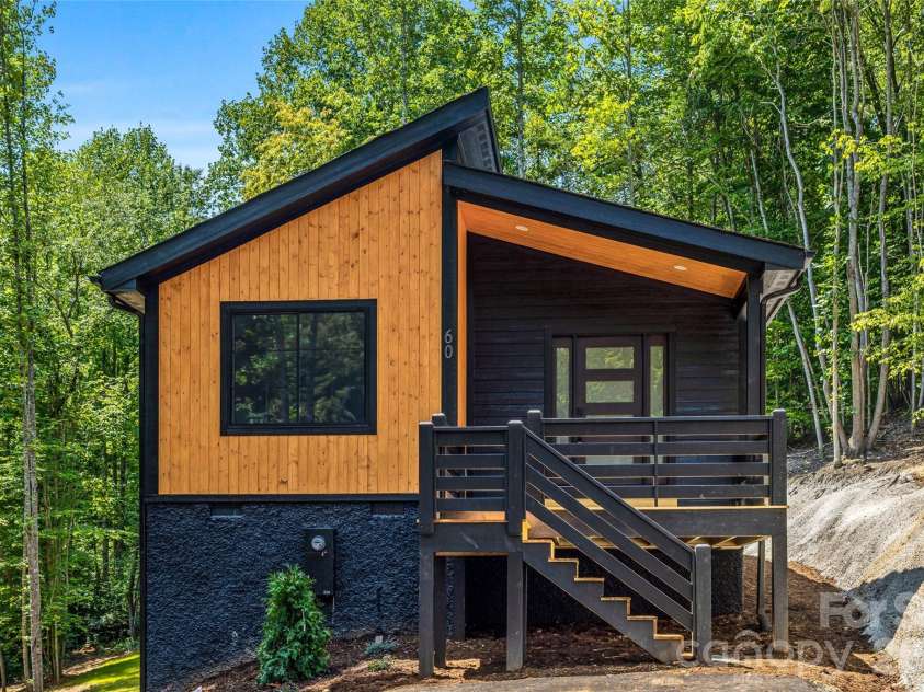 60 Catatoga Trail, Marion, NC 83452.  MLS# CAR4403563, YatesRealty ID 46556. Modern mountain exterior