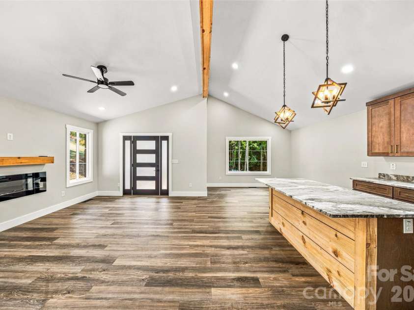 60 Catatoga Trail, Marion, NC 83452.  MLS# CAR4403563, YatesRealty ID 46556. Open-concept living and kitchen