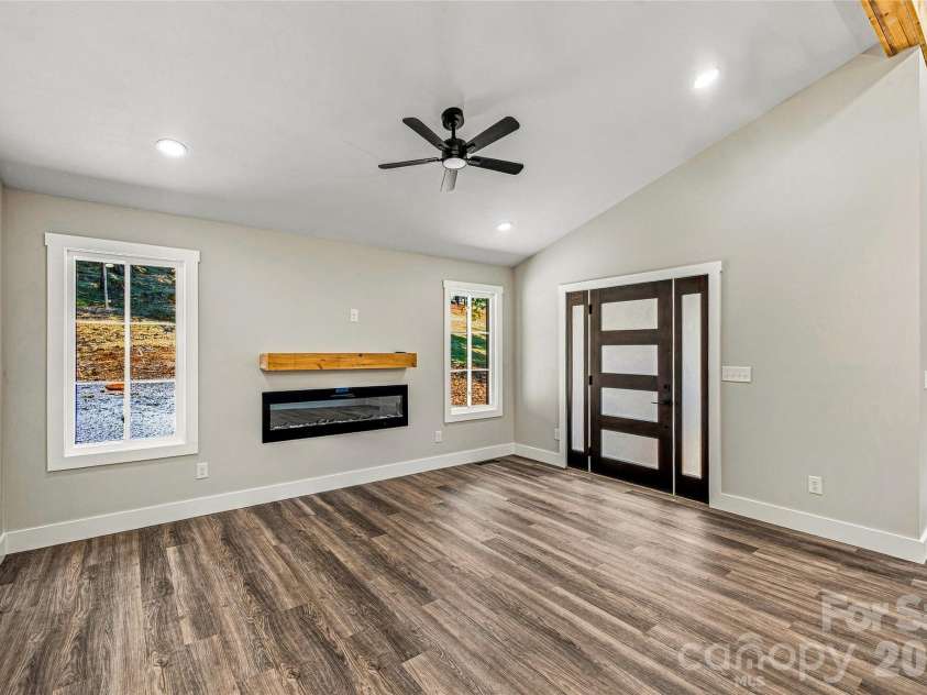 60 Catatoga Trail, Marion, NC 83452.  MLS# CAR4403563, YatesRealty ID 46556. Spacious bedroom with vaulted ceiling