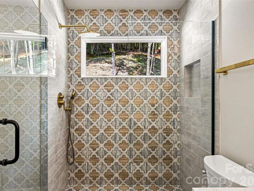 60 Catatoga Trail, Marion, NC 83452.  MLS# CAR4403563, YatesRealty ID 46556. Tiled walk-in shower