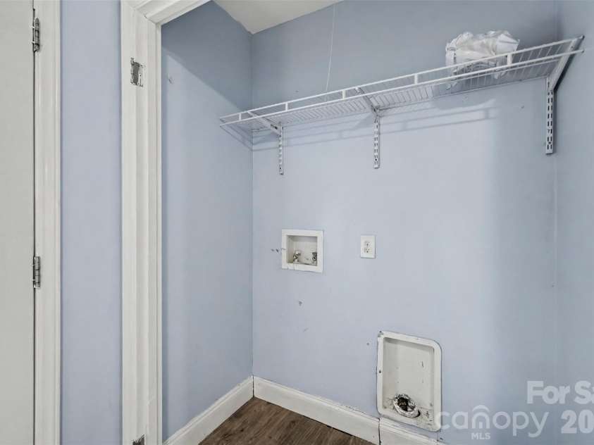 802 Stowe Drive, Lowell, NC 28098.  MLS# CAR4417684, YatesRealty ID 46559. Laundry area