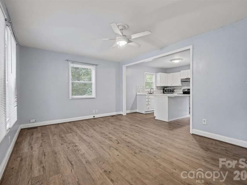 802 Stowe Drive, Lowell, NC 28098.  MLS# CAR4417684, YatesRealty ID 46559. Living room