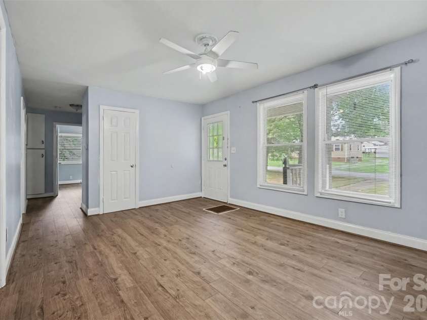 802 Stowe Drive, Lowell, NC 28098.  MLS# CAR4417684, YatesRealty ID 46559. Living room