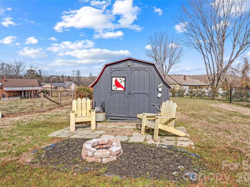113 Hardy Street, Jonesville, NC 28642.  MLS# CAR4350746, YatesRealty ID 4656. Fire pit and barn