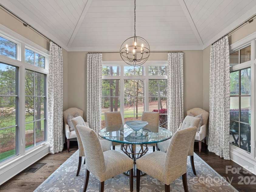 138 Great Point Drive, Mooresville, NC 28117.  MLS# CAR4242736, YatesRealty ID 4656. Breakfast area with cathedral ceiling
