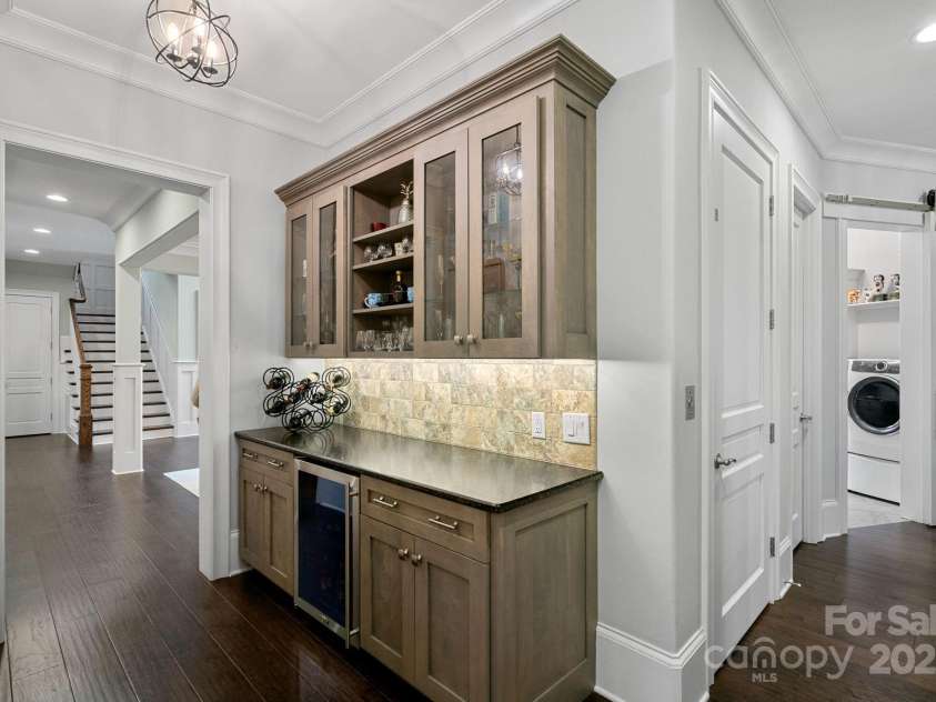 138 Great Point Drive, Mooresville, NC 28117.  MLS# CAR4242736, YatesRealty ID 4656. Butler's pantry with beverage fridge