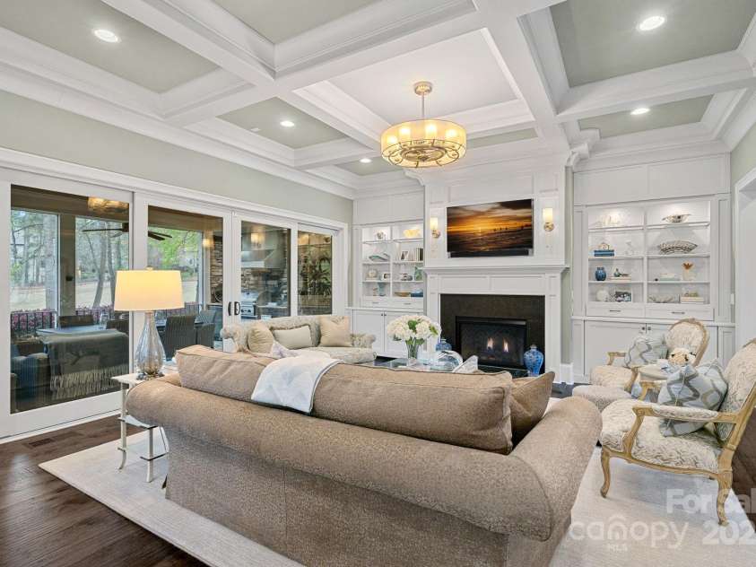138 Great Point Drive, Mooresville, NC 28117.  MLS# CAR4242736, YatesRealty ID 4656. Coffered ceiling & built-ins