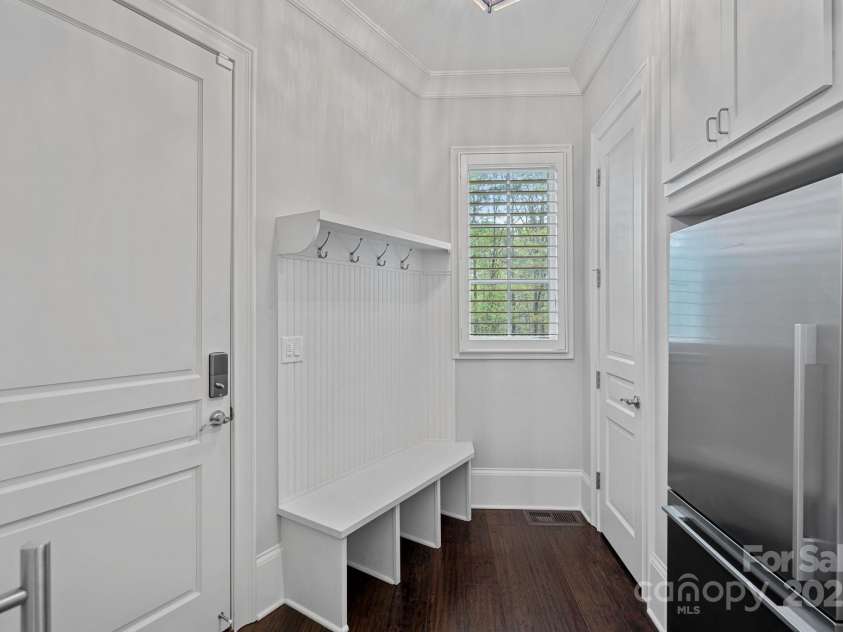 138 Great Point Drive, Mooresville, NC 28117.  MLS# CAR4242736, YatesRealty ID 4656. Drop zone off garage