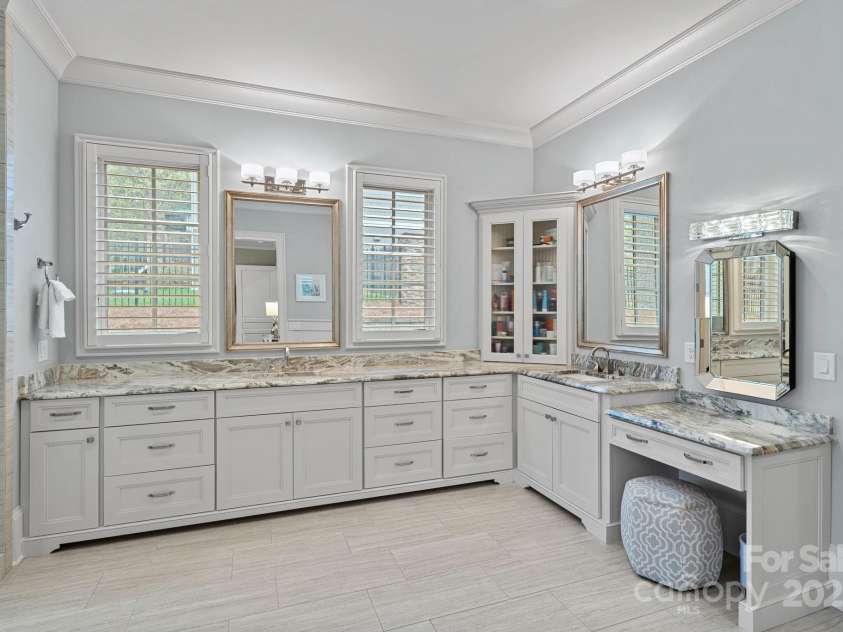 138 Great Point Drive, Mooresville, NC 28117.  MLS# CAR4242736, YatesRealty ID 4656. Primary bath with custom cabinets