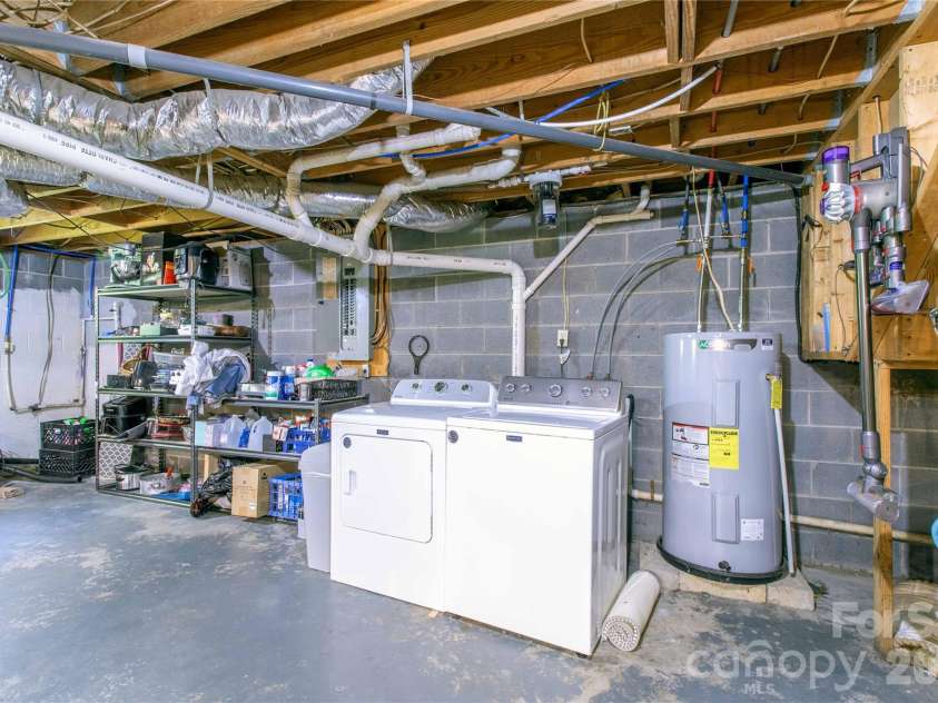 570 Flat Creek Valley Road, Lake Toxaway, NC 28747.  MLS# CAR4416431, YatesRealty ID 46565. Basement