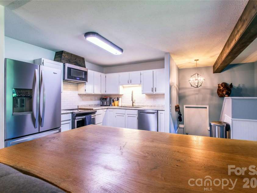 570 Flat Creek Valley Road, Lake Toxaway, NC 28747.  MLS# CAR4416431, YatesRealty ID 46565. Breakfast bar
