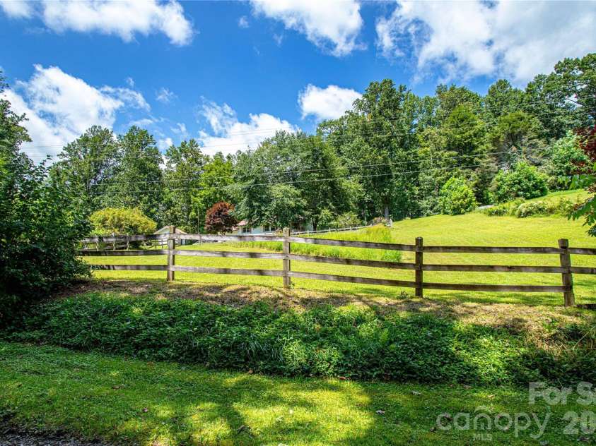 570 Flat Creek Valley Road, Lake Toxaway, NC 28747.  MLS# CAR4416431, YatesRealty ID 46565. Front pasture area