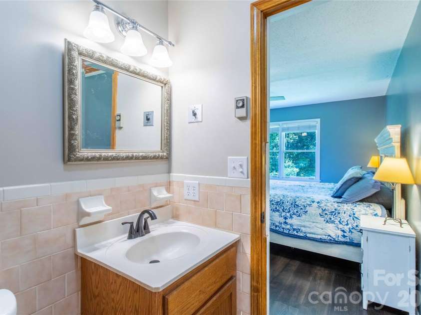 570 Flat Creek Valley Road, Lake Toxaway, NC 28747.  MLS# CAR4416431, YatesRealty ID 46565. Primary bath