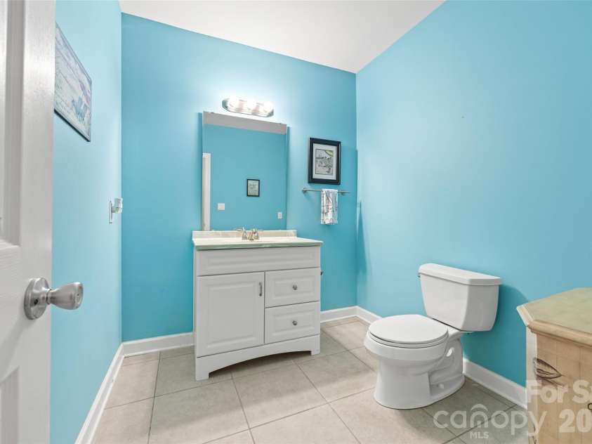 771 Cherry Hills Place, Rock Hill, SC 29730.  MLS# CAR4417475, YatesRealty ID 46566. Convenient half bath on the basement level. Large enough that a shower could be added.  This could actually be a second living space if needed.