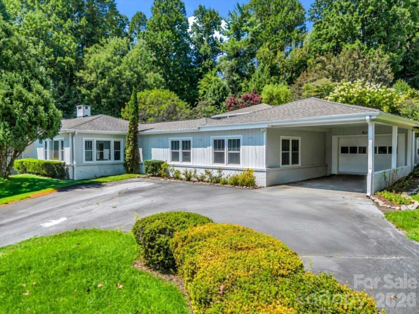 370 Orchard Circle, Laurel Park, NC 28739.  MLS# CAR4416531, YatesRealty ID 46572. Carport with U-Shaped Garage
