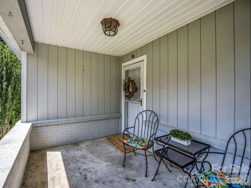 370 Orchard Circle, Laurel Park, NC 28739.  MLS# CAR4416531, YatesRealty ID 46572. Enjoy coffee on the front porch