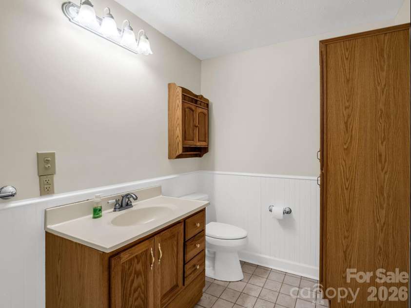 370 Orchard Circle, Laurel Park, NC 28739.  MLS# CAR4416531, YatesRealty ID 46572. Primary Bath