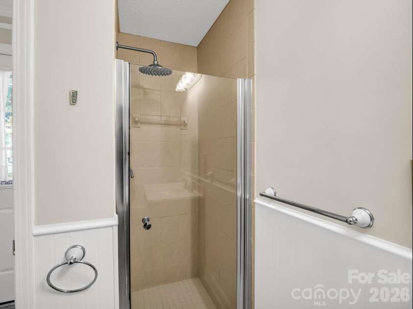 370 Orchard Circle, Laurel Park, NC 28739.  MLS# CAR4416531, YatesRealty ID 46572. Primary Bath Shower