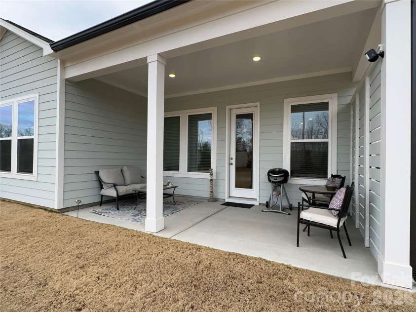 1104 Idyllic Lane, Waxhaw, NC 28173.  MLS# CAR4340433, YatesRealty ID 4658. Covered Back Patio