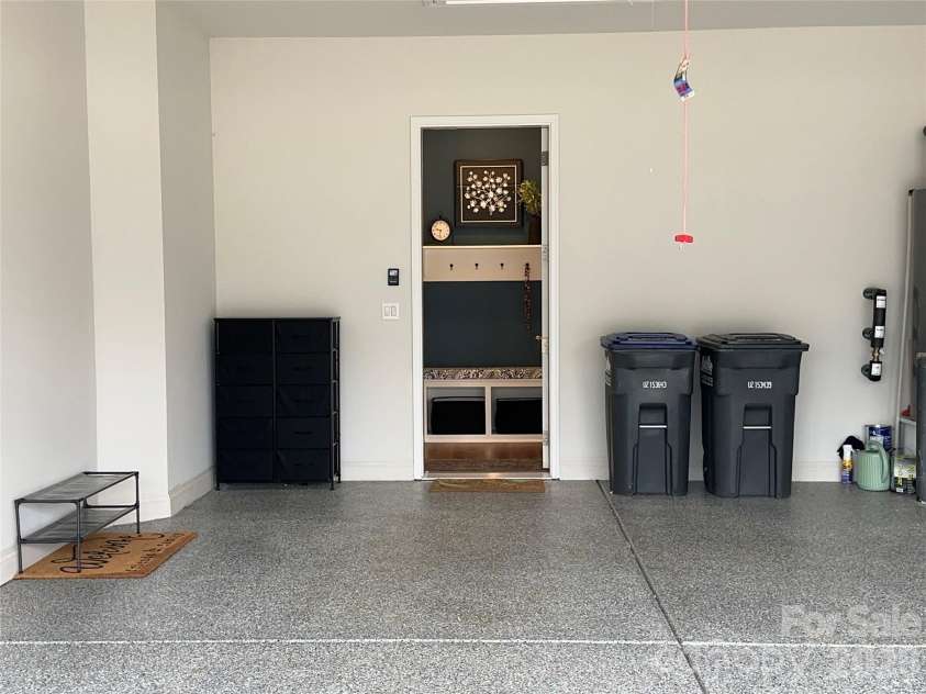 1104 Idyllic Lane, Waxhaw, NC 28173.  MLS# CAR4340433, YatesRealty ID 4658. Epoxy Garage Floor