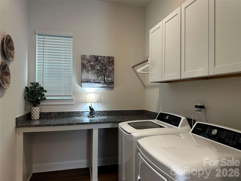 1104 Idyllic Lane, Waxhaw, NC 28173.  MLS# CAR4340433, YatesRealty ID 4658. Laundry Room w/ Counter & Cabinets