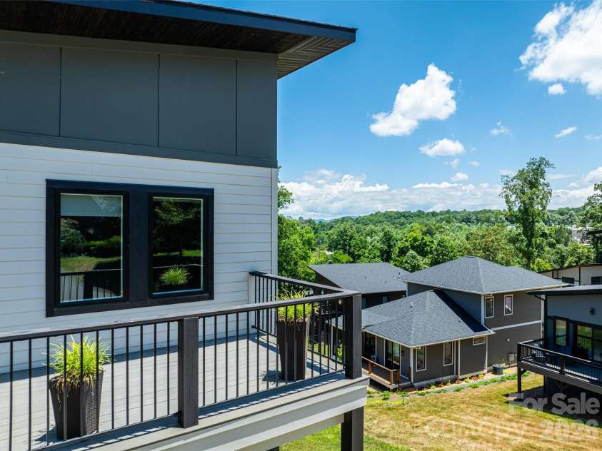 303 Iron Ridge Loop, Asheville, NC 28806.  MLS# CAR4353423, YatesRealty ID 4659. 2nd Floor front porch