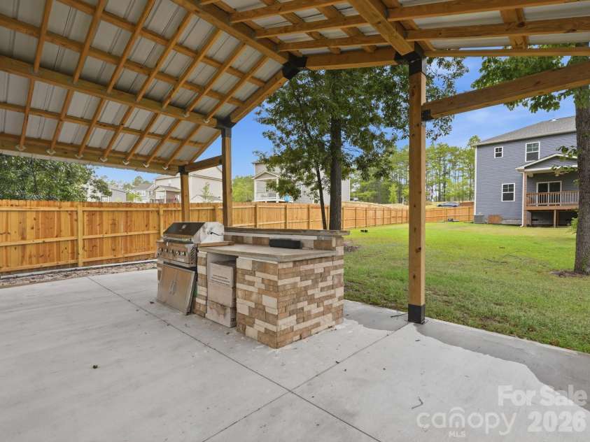 205 Shadowbrook Way, Kershaw, SC 29020.  MLS# CAR4417898, YatesRealty ID 46590. Stone Grill Area