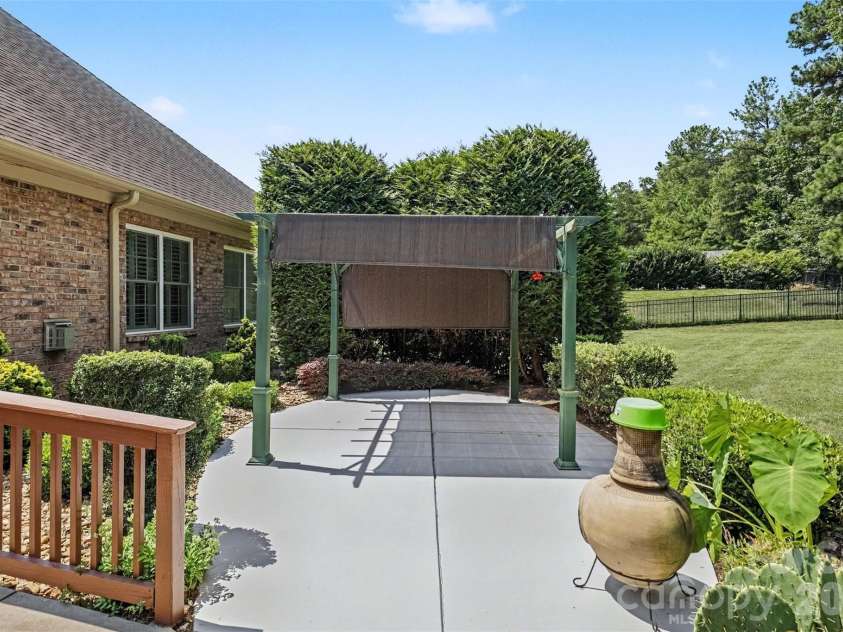 1820 Wedowee Court, Rock Hill, SC 29732.  MLS# CAR4416667, YatesRealty ID 46603. Gorgeous patio/pergola view