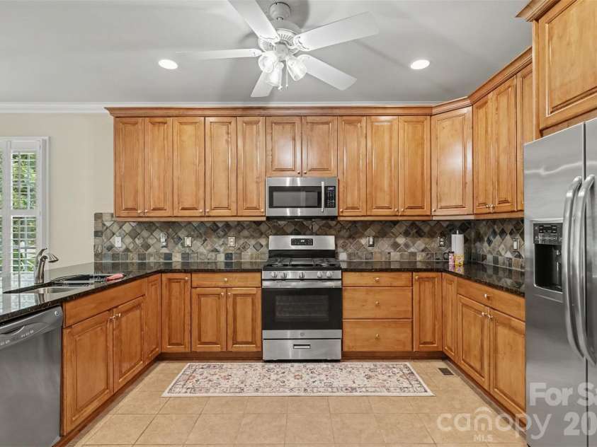 1820 Wedowee Court, Rock Hill, SC 29732.  MLS# CAR4416667, YatesRealty ID 46603. Spacious open-concept kitchen featuring modern appliances