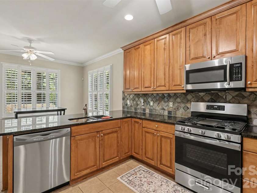 1820 Wedowee Court, Rock Hill, SC 29732.  MLS# CAR4416667, YatesRealty ID 46603. Spacious open-concept kitchen featuring modern appliances