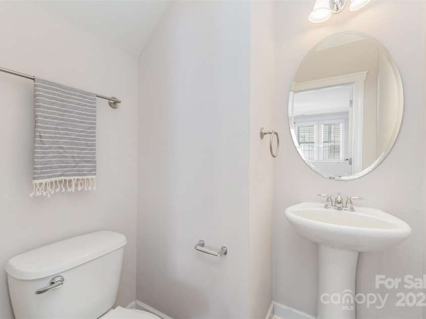 5520 Allison Lane, Charlotte, NC 28277.  MLS# CAR4292512, YatesRealty ID 4661. Downstairs powder room
