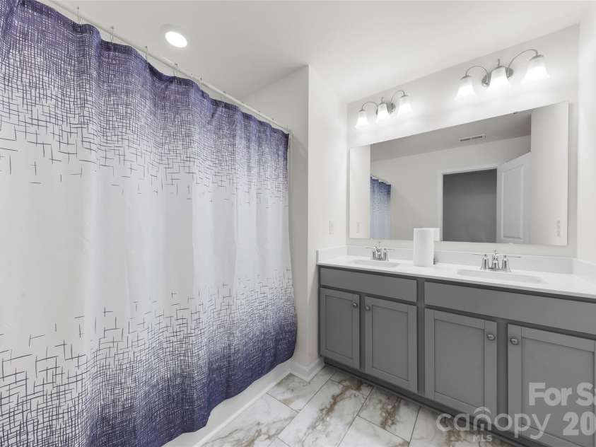 5250 Maynard Hill Drive, Monroe, NC 28110.  MLS# CAR4417834, YatesRealty ID 46622. Guest Bathroom