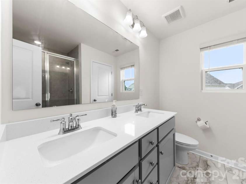 5250 Maynard Hill Drive, Monroe, NC 28110.  MLS# CAR4417834, YatesRealty ID 46622. Primary Bathroom