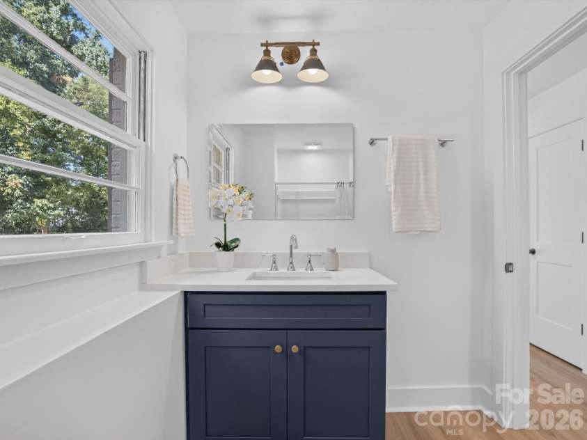 2532 Sam Newell Road, Matthews, NC 28105.  MLS# CAR4416566, YatesRealty ID 46630. A bold vanity adds character.