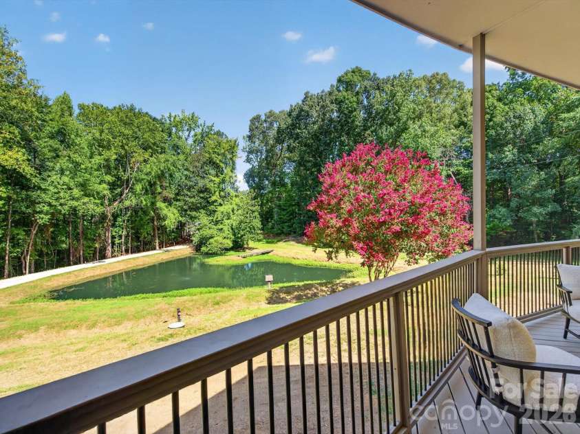 2532 Sam Newell Road, Matthews, NC 28105.  MLS# CAR4416566, YatesRealty ID 46630. A porch with a view.