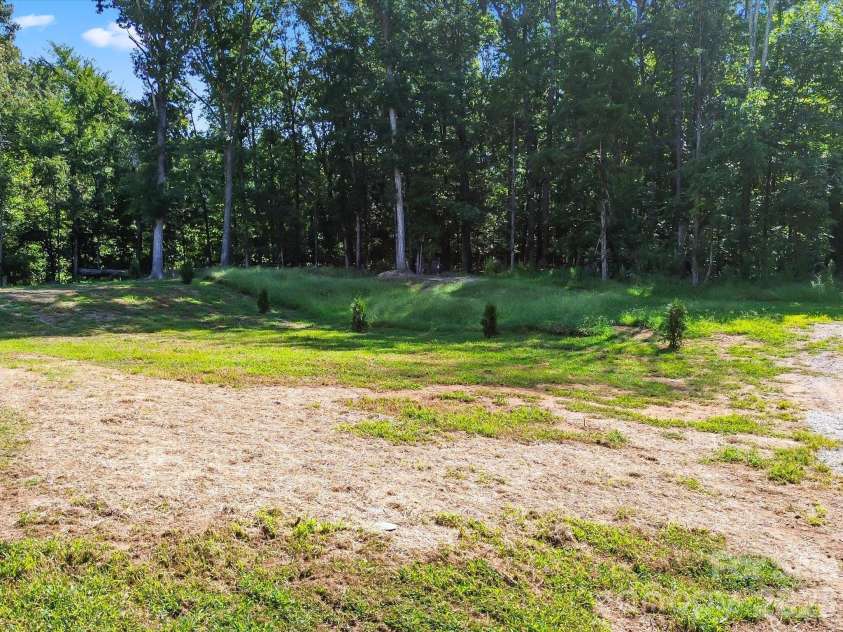 2532 Sam Newell Road, Matthews, NC 28105.  MLS# CAR4416566, YatesRealty ID 46630. Large/Flat Backyard