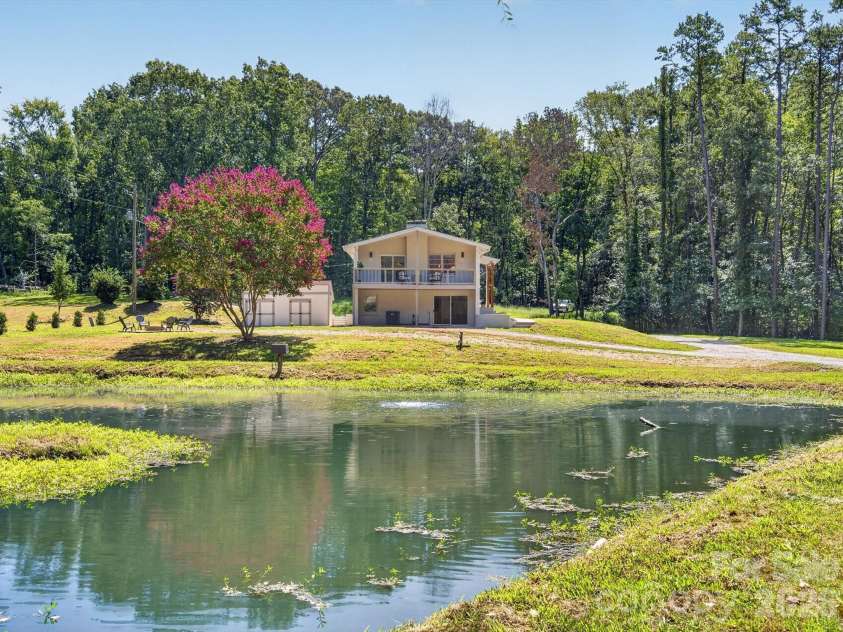 2532 Sam Newell Road, Matthews, NC 28105.  MLS# CAR4416566, YatesRealty ID 46630. Peaceful pond views at home.