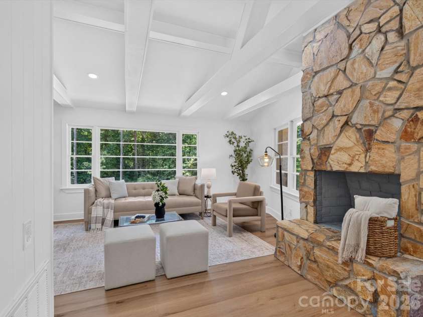 2532 Sam Newell Road, Matthews, NC 28105.  MLS# CAR4416566, YatesRealty ID 46630. Stone fireplace steals the show.