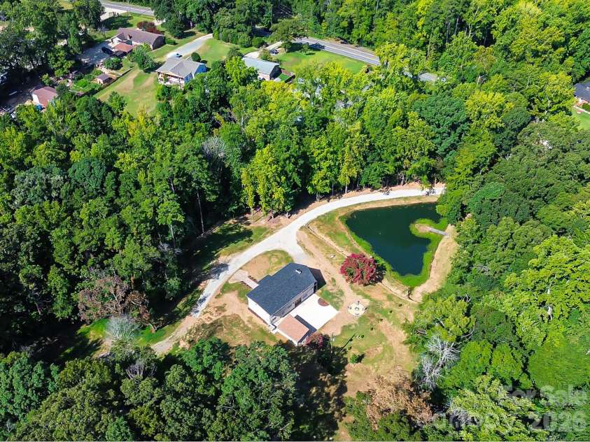 2532 Sam Newell Road, Matthews, NC 28105.  MLS# CAR4416566, YatesRealty ID 46630. Surrounded by natural beauty.