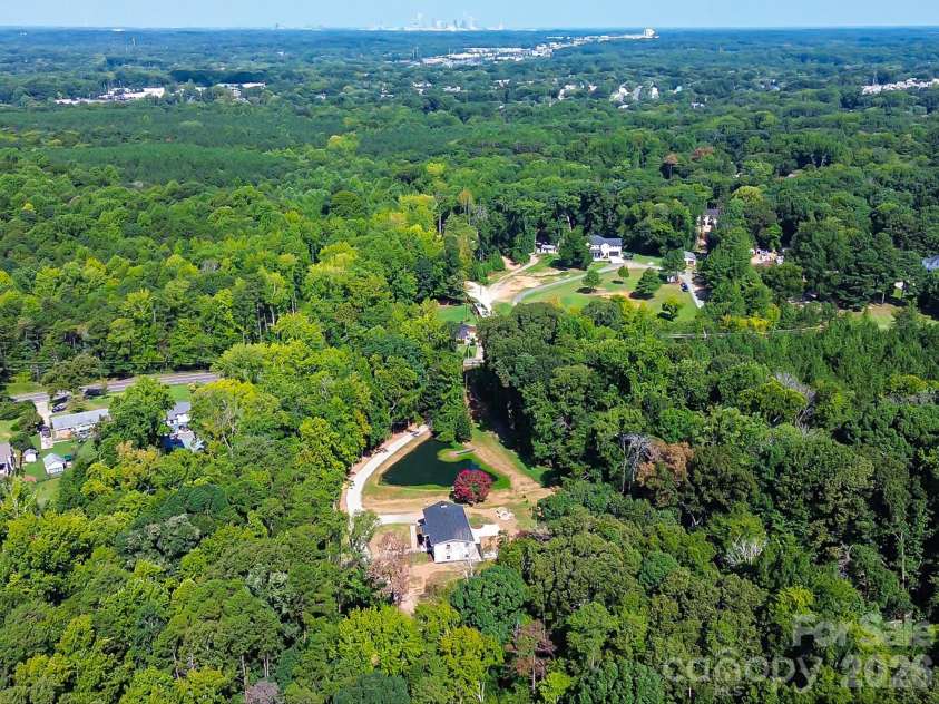 2532 Sam Newell Road, Matthews, NC 28105.  MLS# CAR4419939, YatesRealty ID 46630. 