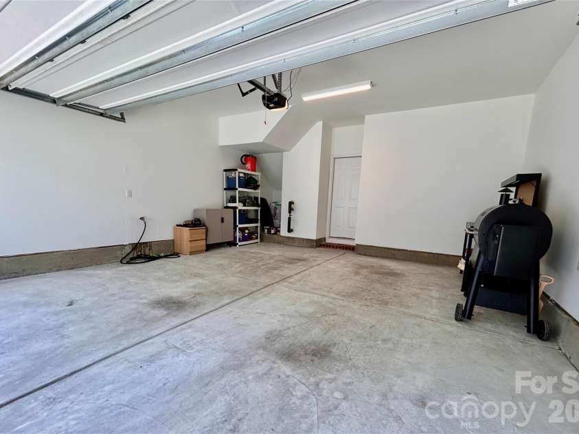 2414 Magnolia Blossom Way, Charlotte, NC 28211.  MLS# CAR4412045, YatesRealty ID 46633. 2 car freshly painted garage with EV 240 V outlet