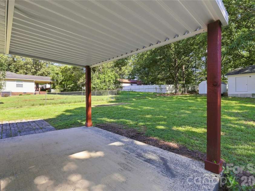 5241 Short Cut Lane, Indian Trail, NC 28079.  MLS# CAR4415304, YatesRealty ID 46636. Covered Patio